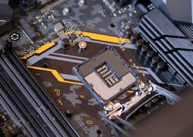 Detailed view of a computer motherboard highlighting electronic components and technology connections.